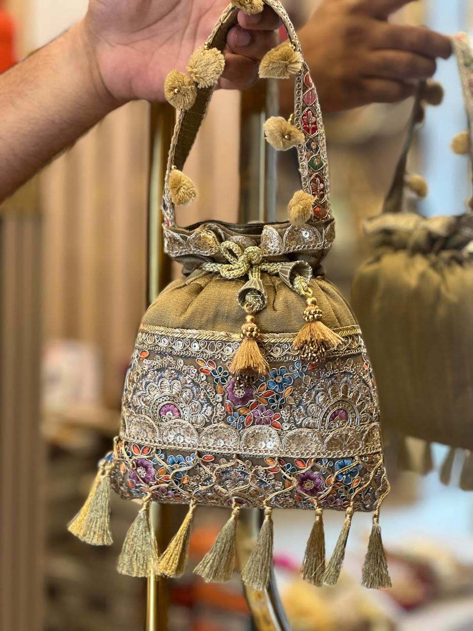 Silk Potli Bag with Hand Embroidery, Pom Pom & Tassels La Vie Bien Silk Potli Bag with Hand Embroidery, Pom Pom & Tassels