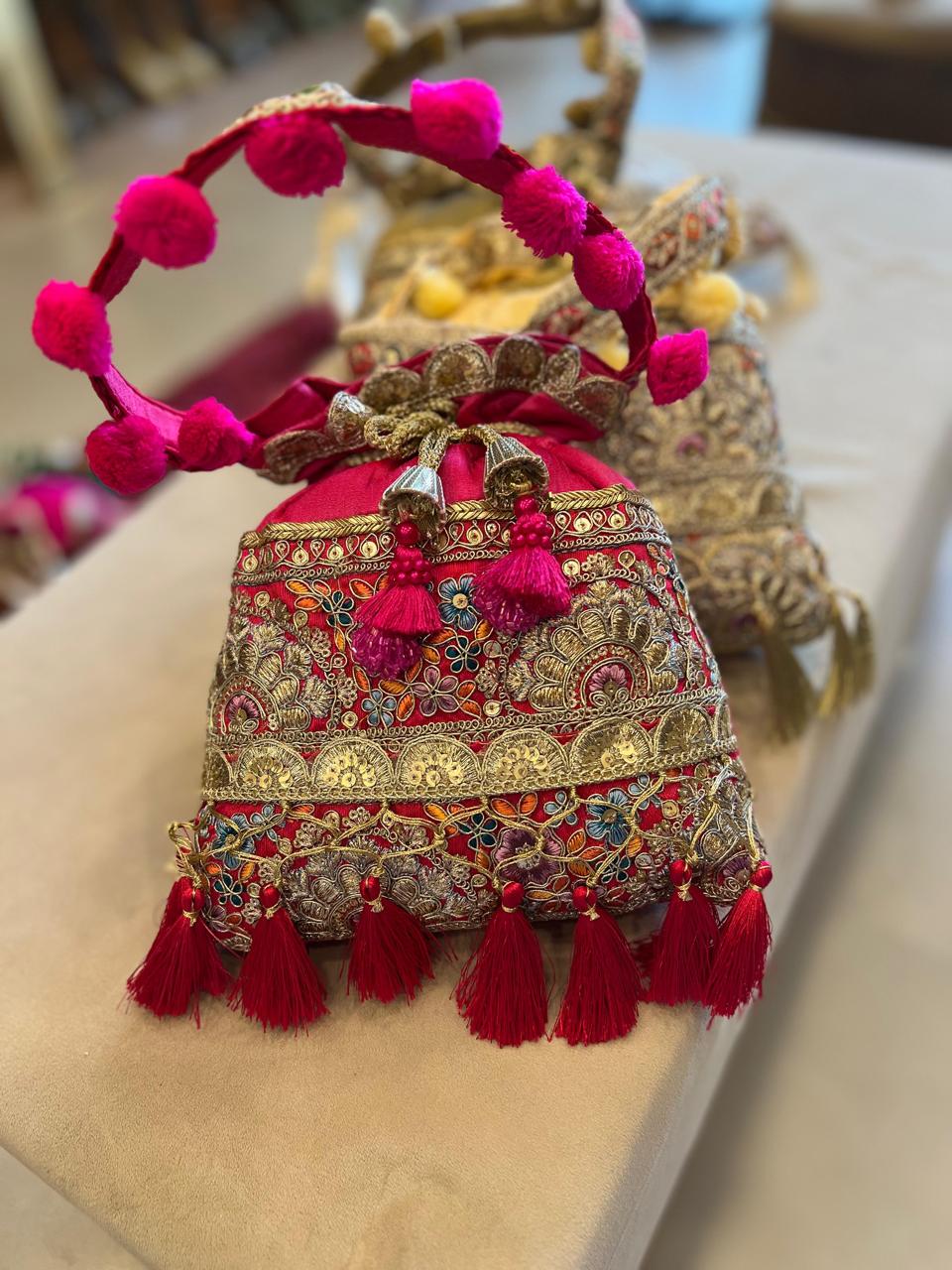 Silk Potli Bag with Hand Embroidery, Pom Pom & Tassels La Vie Bien Silk Potli Bag with Hand Embroidery, Pom Pom & Tassels