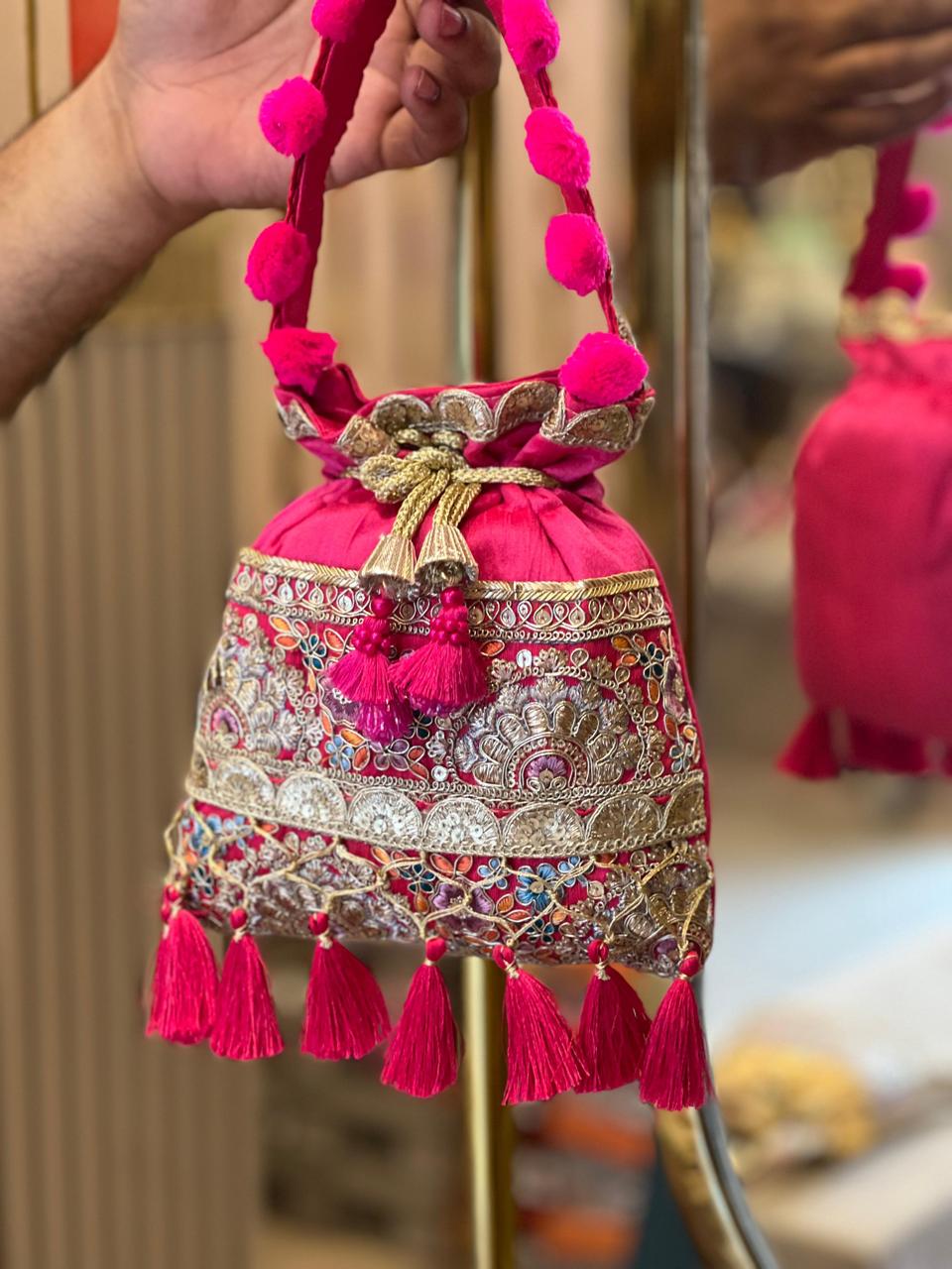 Silk Potli Bag with Hand Embroidery, Pom Pom & Tassels La Vie Bien Silk Potli Bag with Hand Embroidery, Pom Pom & Tassels