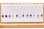 Silver Birthstone necklace by Alegria Accessories Inc