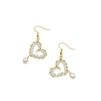 Smitten crystal and gold heart earrings with pearl by Alegria Accessories Inc