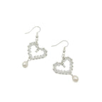Smitten crystal and silver heart earrings with pearl by Alegria Accessories Inc