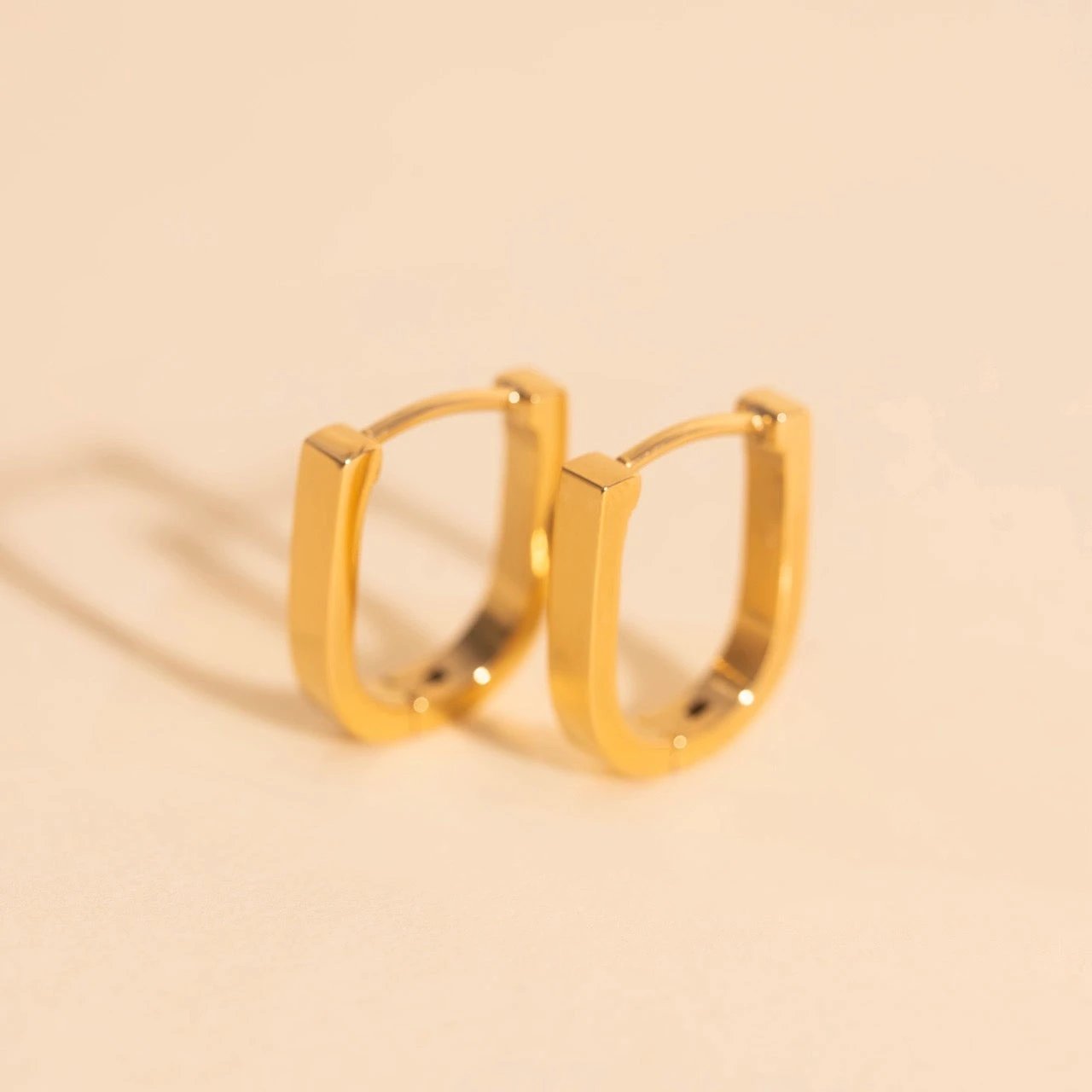 Smooth Stirrup Huggie Hoop Earrings by Oh Clementine