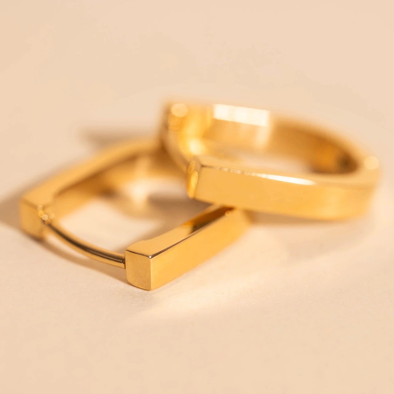 Smooth Stirrup Huggie Hoop Earrings by Oh Clementine