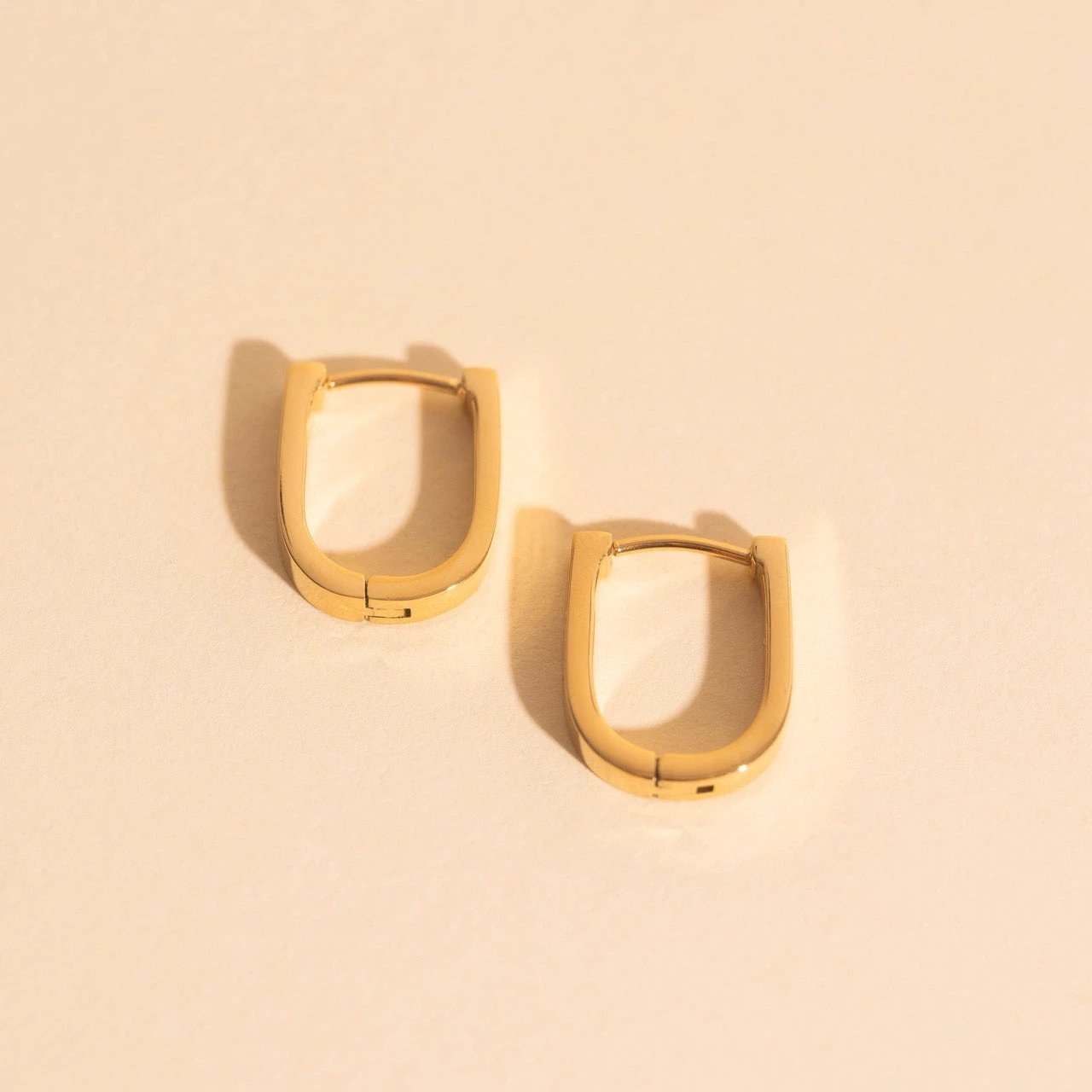 Smooth Stirrup Huggie Hoop Earrings by Oh Clementine
