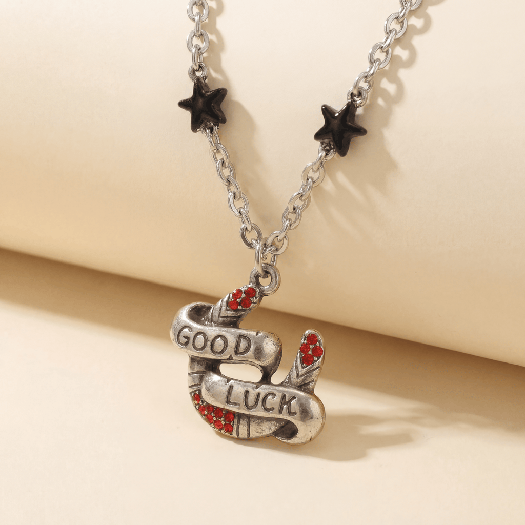 Sourpuss "Good Luck” Horseshoe Necklace with Red Rhinestones & Black Star Charms Necklaces La Vie Bien Sourpuss "Good Luck” Horseshoe Necklace with Red Rhinestones & Black Star Charms