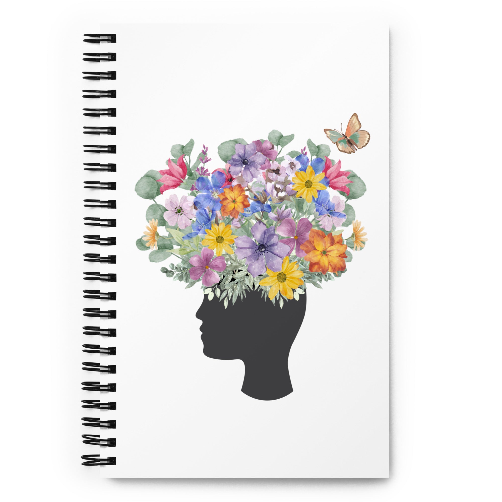 An image of the Spiral dotted notebook and a graphic of a head with flowers coming out of the top