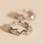 Squiggly Rounded Huggie Hoop Earrings by Oh Clementine