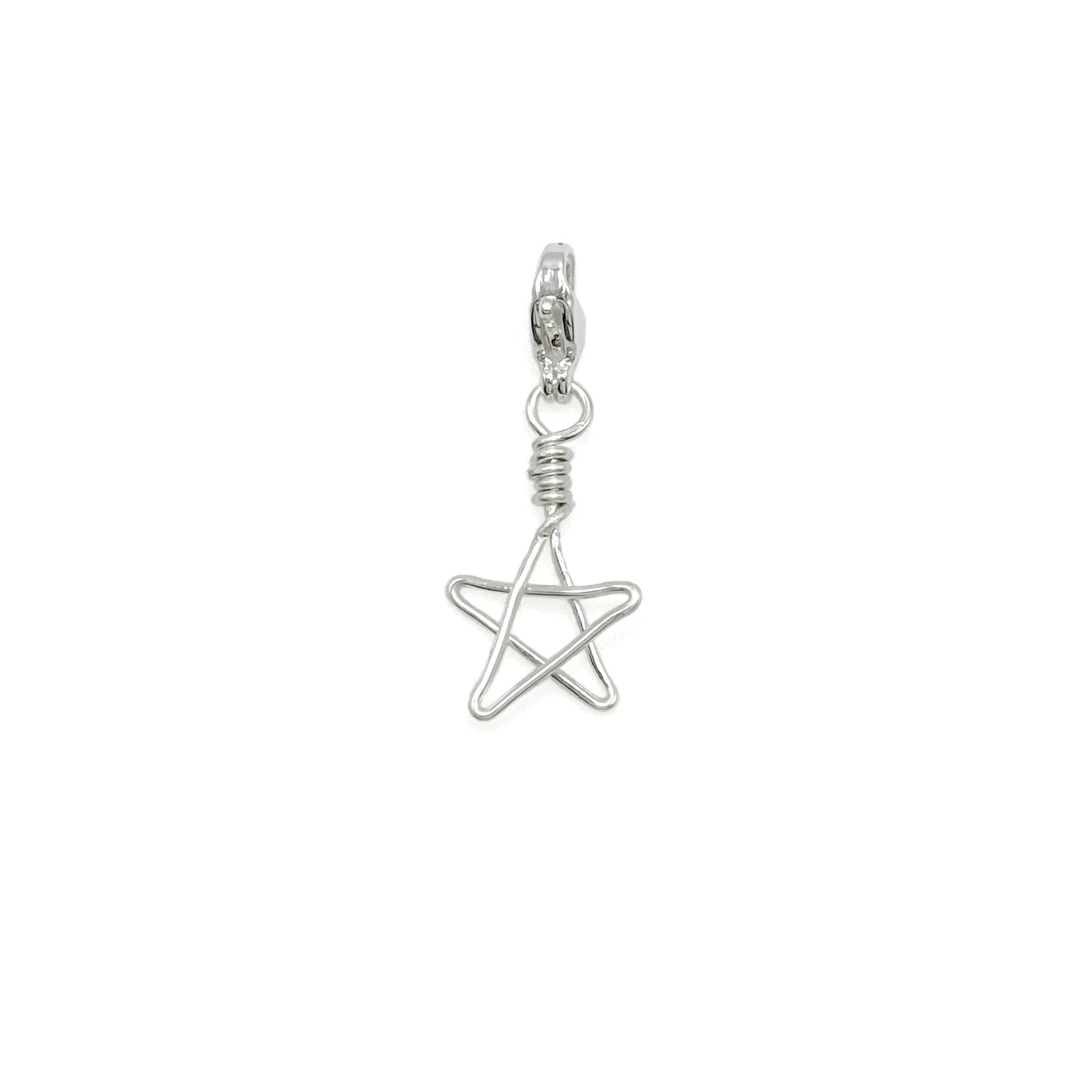 Star silver charm by Alegria Accessories Inc