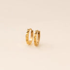 Studded Huggie Hoop Earrings by Oh Clementine