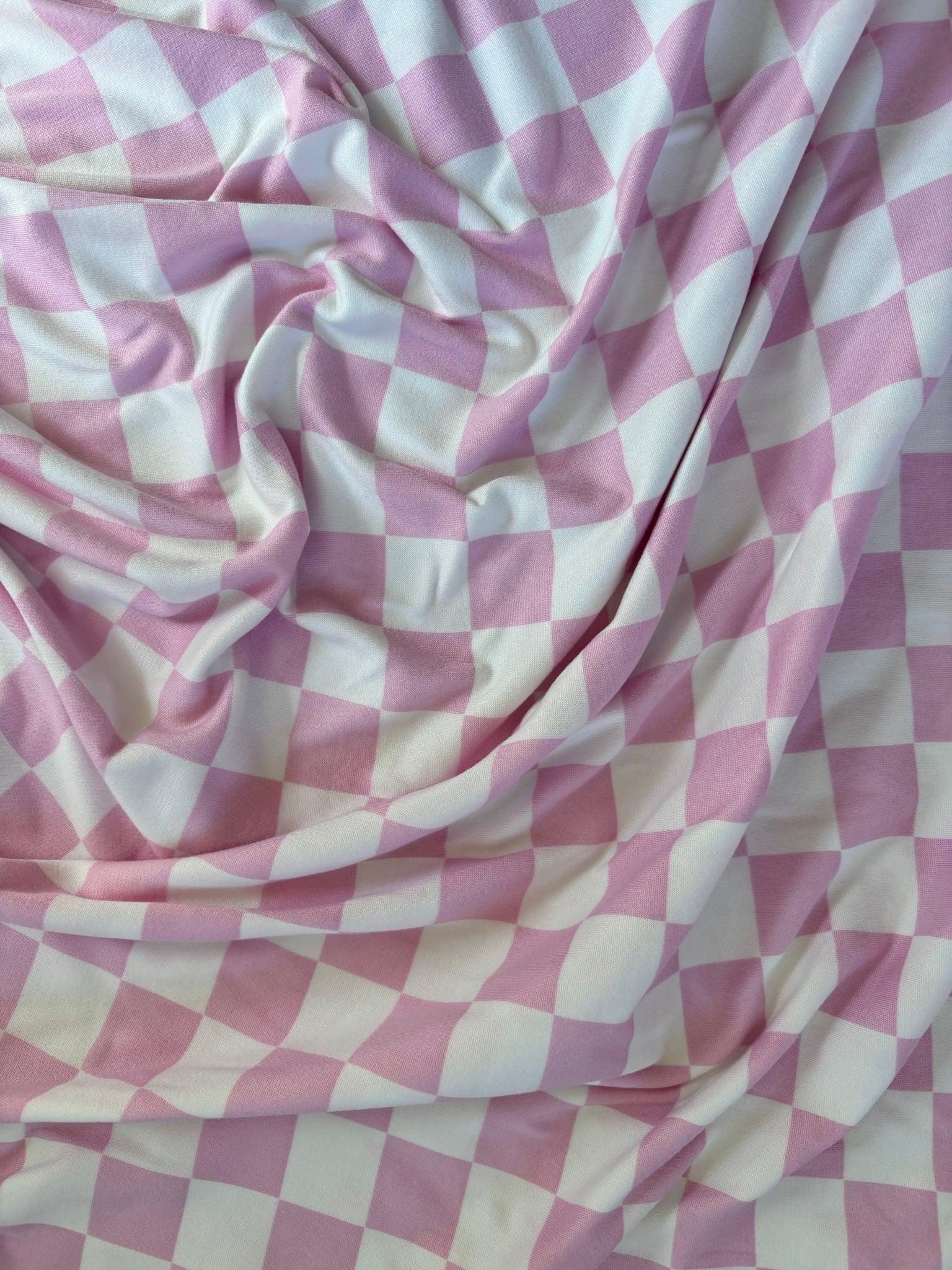 Sugar Pink & White Checkered Stretch Swaddle La Vie Bien Sugar Pink & White Checkered Stretch Swaddle