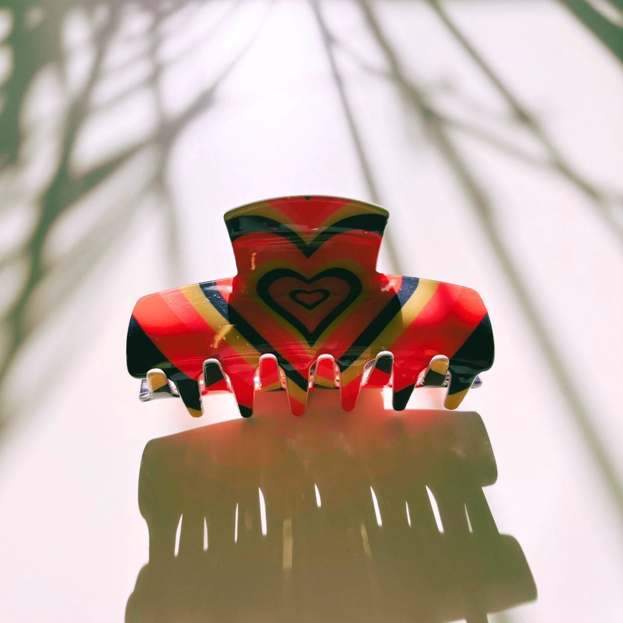 The Foxy in Warm ‘70s Sunrise Hair Claw | Hearts Claw Clip by The Bullish Store
