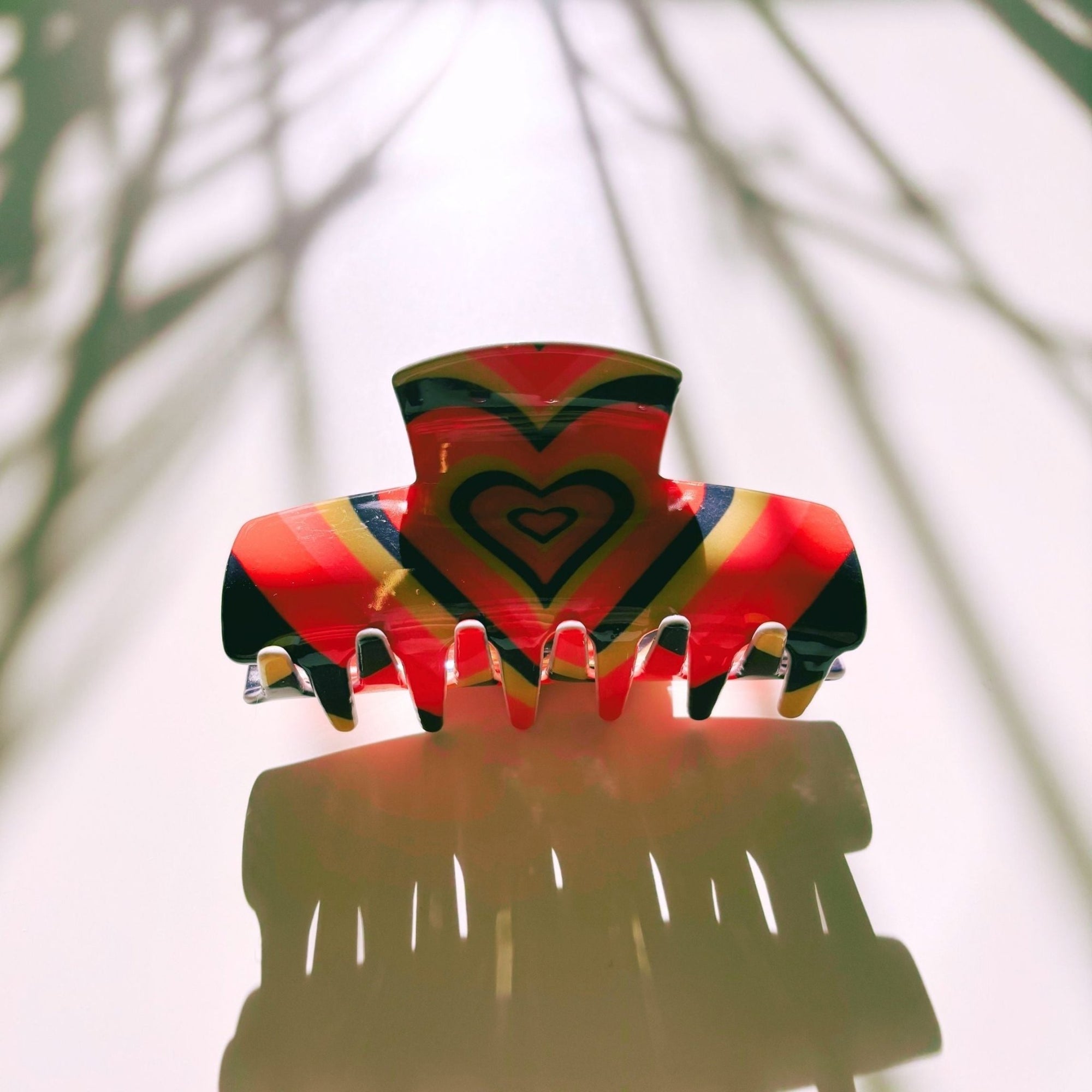 The Foxy in Warm ‘70s Sunrise Hair Claw | Hearts Claw Clip in Velvet Travel Bag