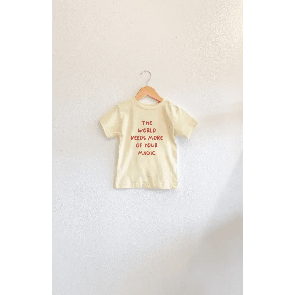 The World Needs More of Your Magic Kids Graphic T-Shirt by Polished Prints