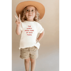 The World Needs More of Your Magic Kids Graphic T-Shirt by Polished Prints