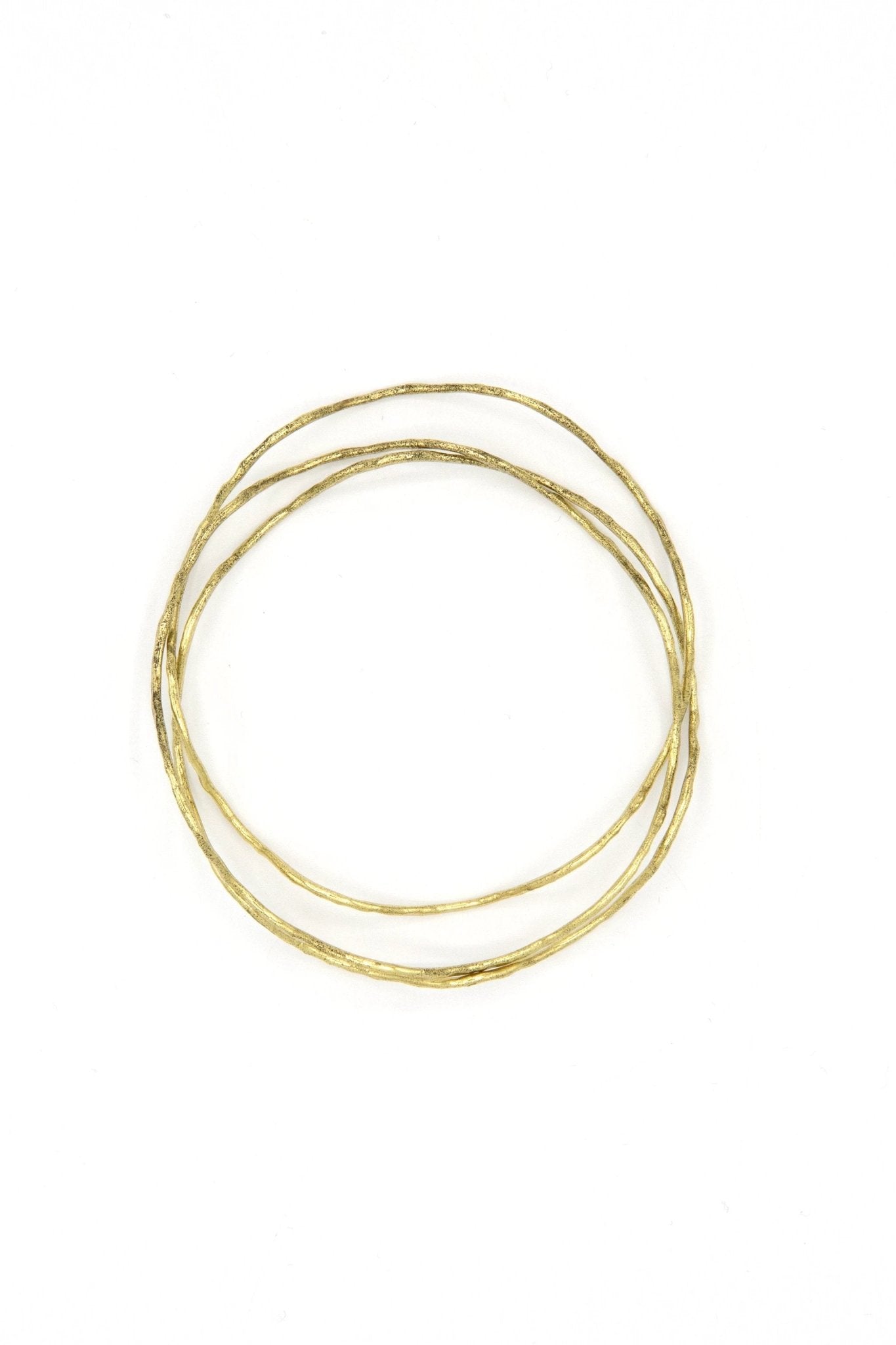 Tidalwave Hammered Brass Bangle Set by Fair Anita