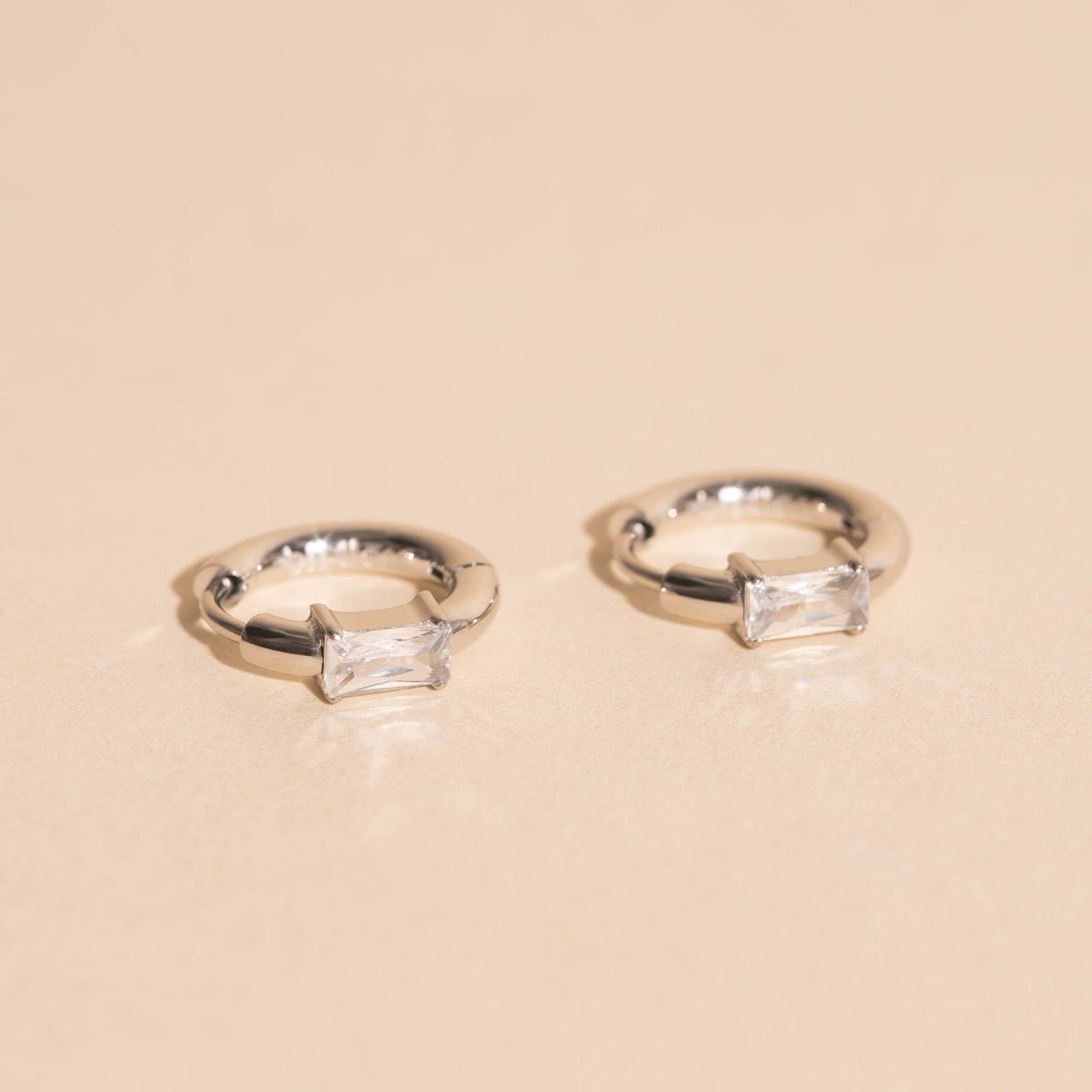 Titanium Baguette Crystal Rounded Huggie Hoop Earrings Rounded Huggie Hoops La Vie Bien Titanium Baguette Crystal Rounded Huggie Hoop Earrings