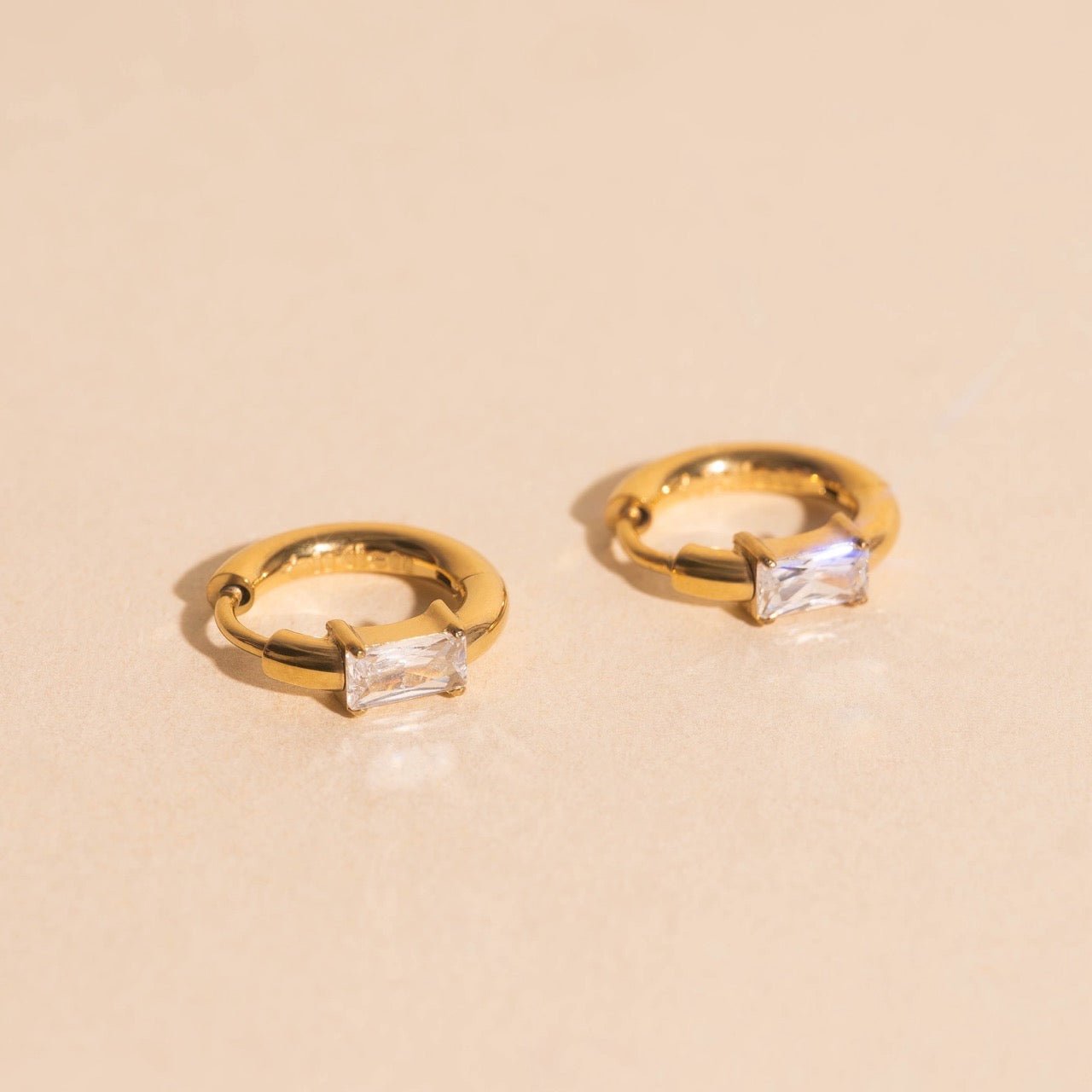 Titanium Baguette Crystal Rounded Huggie Hoop Earrings Rounded Huggie Hoops La Vie Bien Titanium Baguette Crystal Rounded Huggie Hoop Earrings