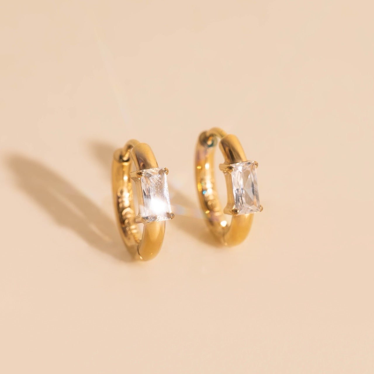 Titanium Baguette Crystal Rounded Huggie Hoop Earrings Rounded Huggie Hoops La Vie Bien Titanium Baguette Crystal Rounded Huggie Hoop Earrings