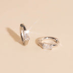 Titanium Baguette Crystal Rounded Huggie Hoop Earrings Rounded Huggie Hoops La Vie Bien Titanium Baguette Crystal Rounded Huggie Hoop Earrings