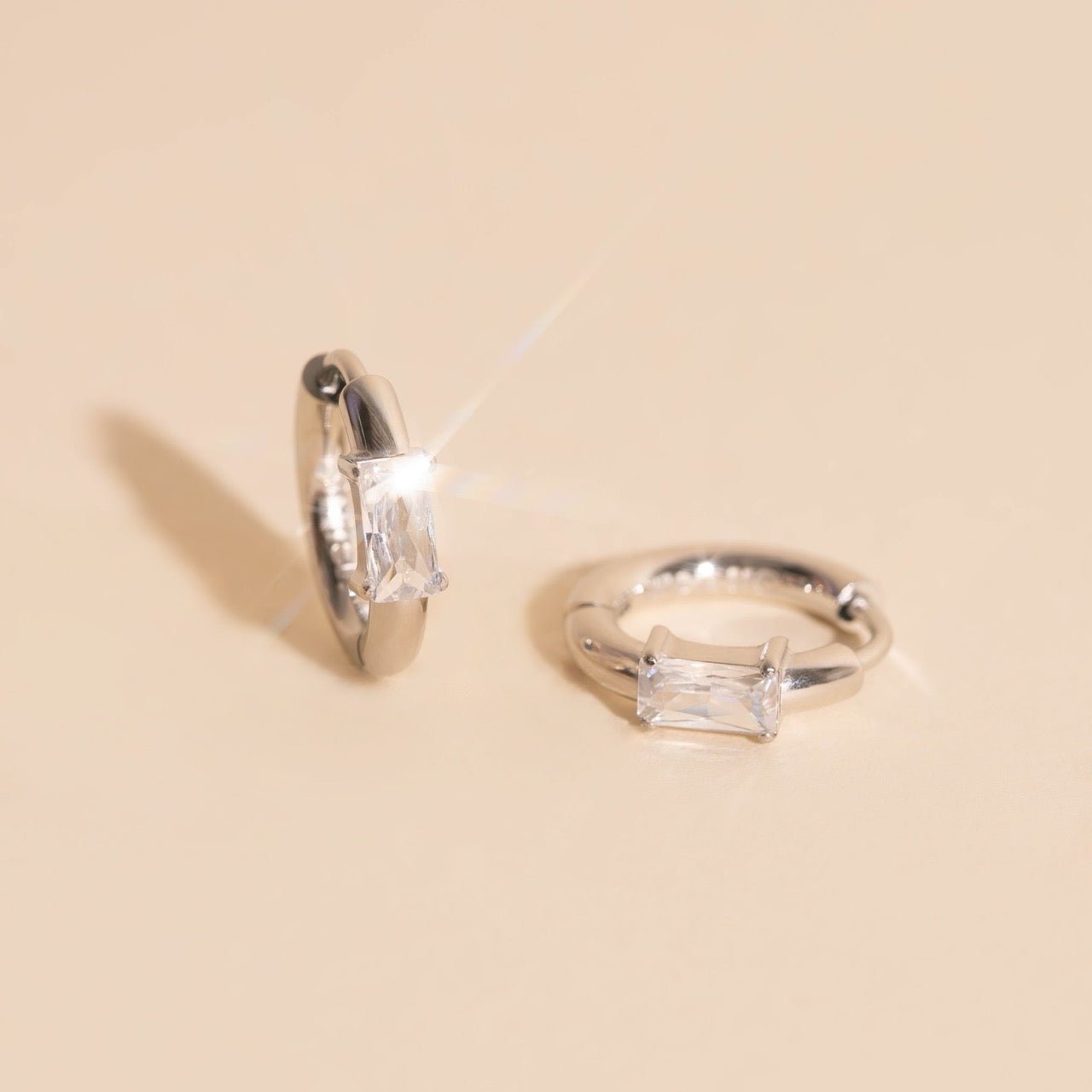 Titanium Baguette Crystal Rounded Huggie Hoop Earrings Rounded Huggie Hoops La Vie Bien Titanium Baguette Crystal Rounded Huggie Hoop Earrings