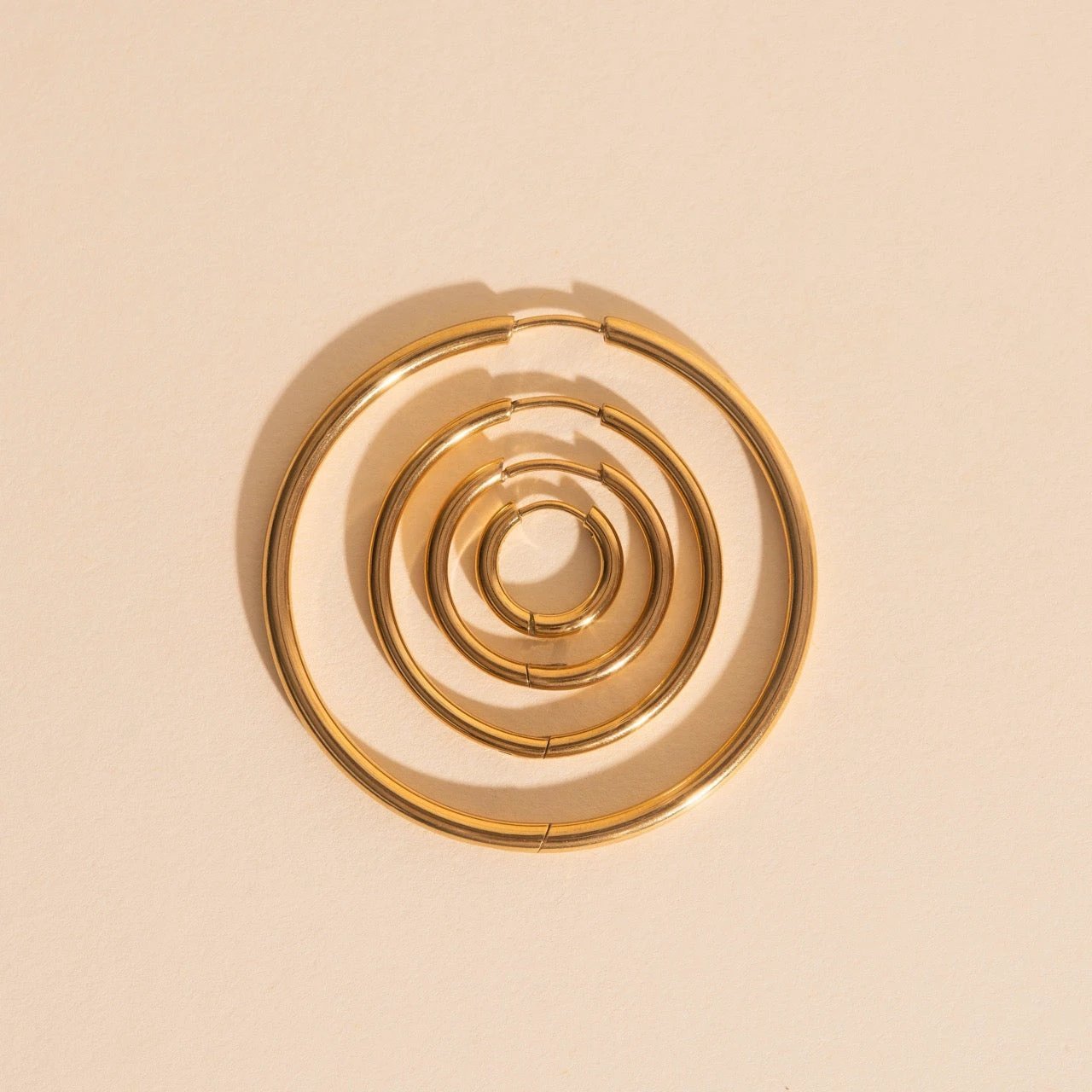 Titanium Circle Rounded Huggie Hoop Earrings by Oh Clementine