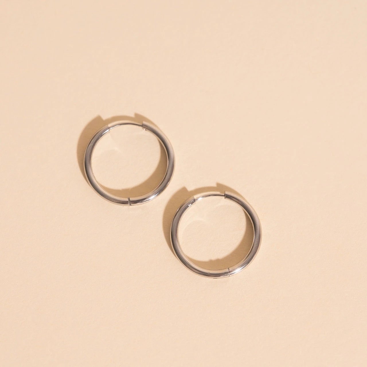 Titanium Circle Rounded Huggie Hoop Earrings by Oh Clementine