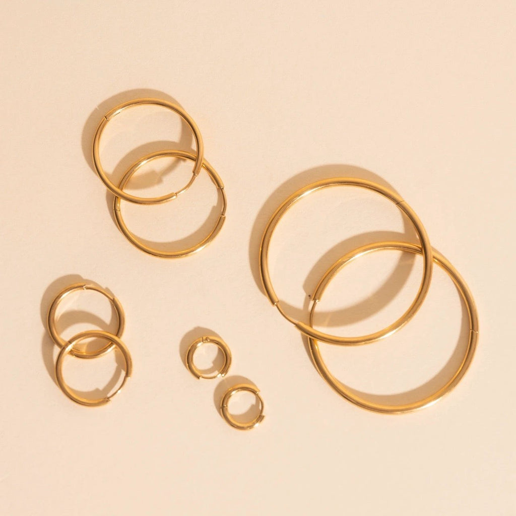 Titanium Circle Rounded Huggie Hoop Earrings by Oh Clementine