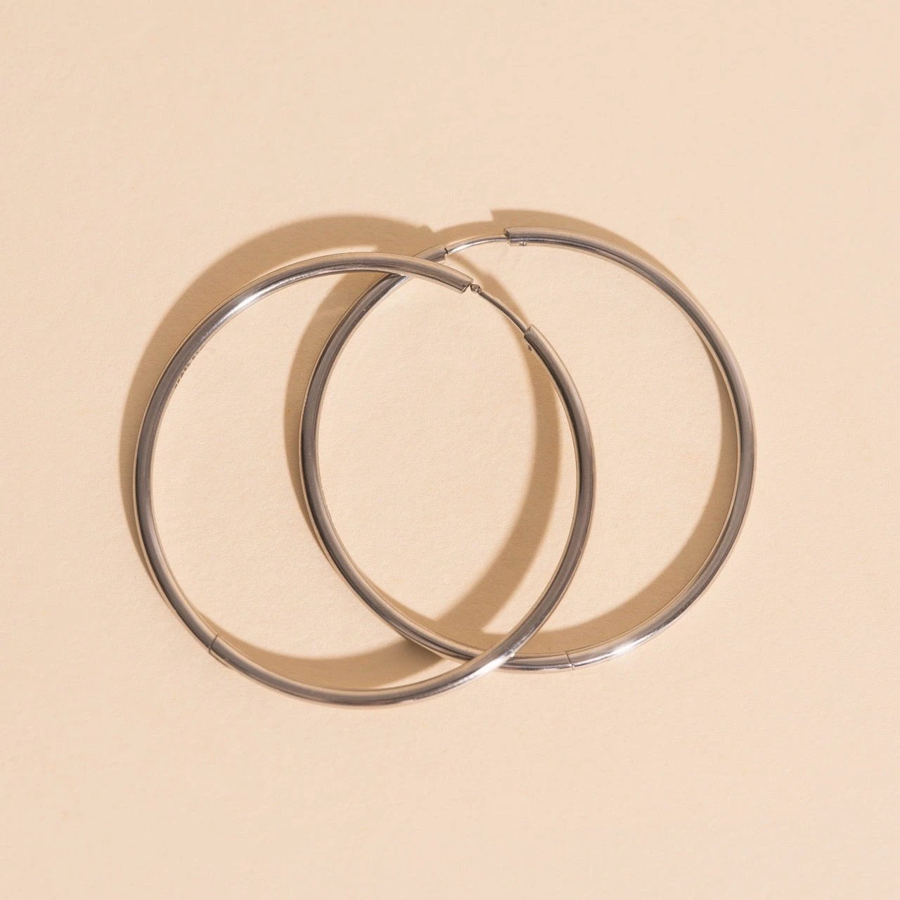Titanium Circle Rounded Huggie Hoop Earrings by Oh Clementine