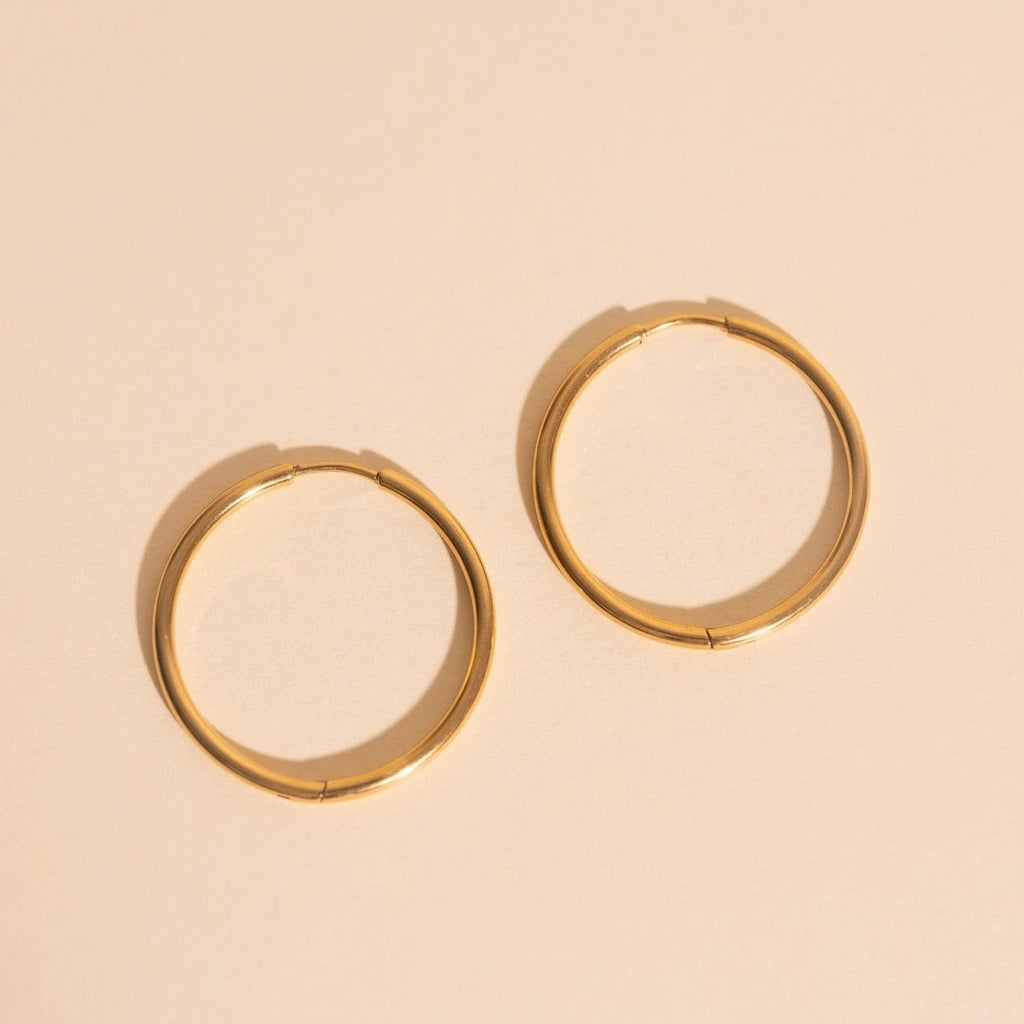 Titanium Circle Rounded Huggie Hoop Earrings by Oh Clementine