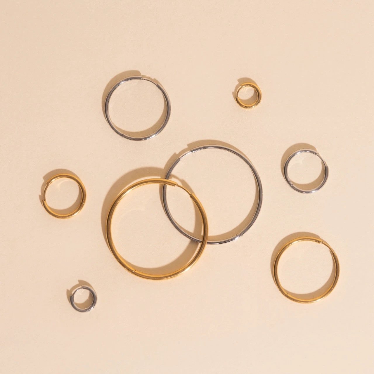 Titanium Circle Rounded Huggie Hoop Earrings by Oh Clementine