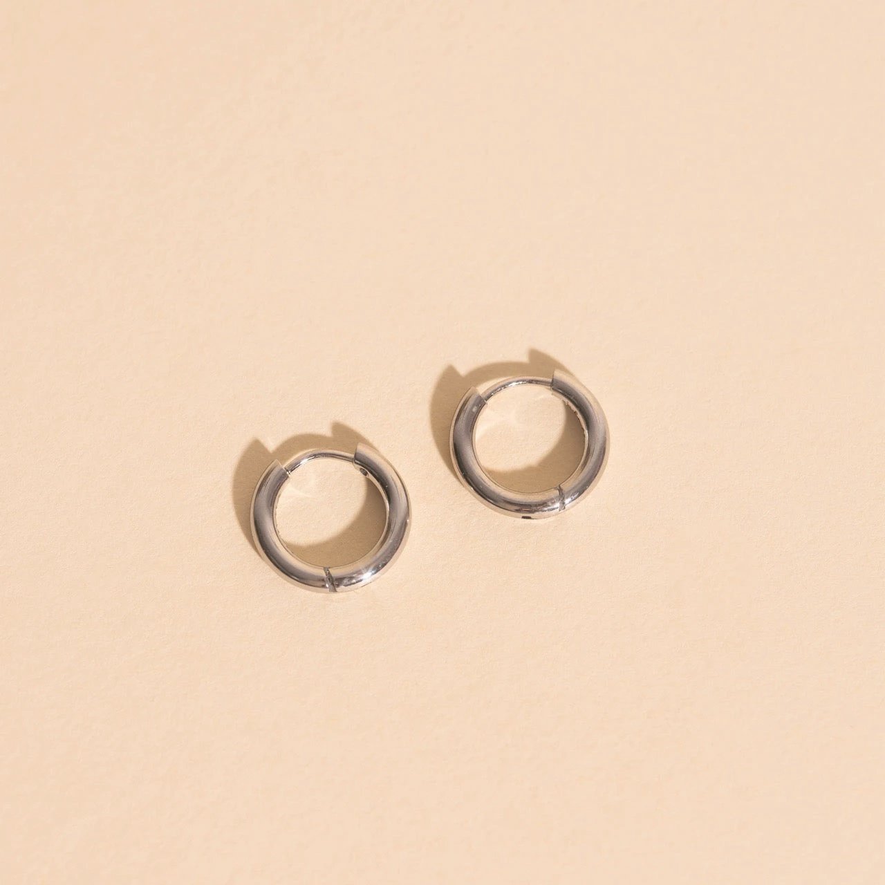 Titanium Mini Rounded Huggie Hoop Earrings by Oh Clementine