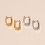 Titanium Smooth Oblong Huggie Hoop Earrings by Oh Clementine