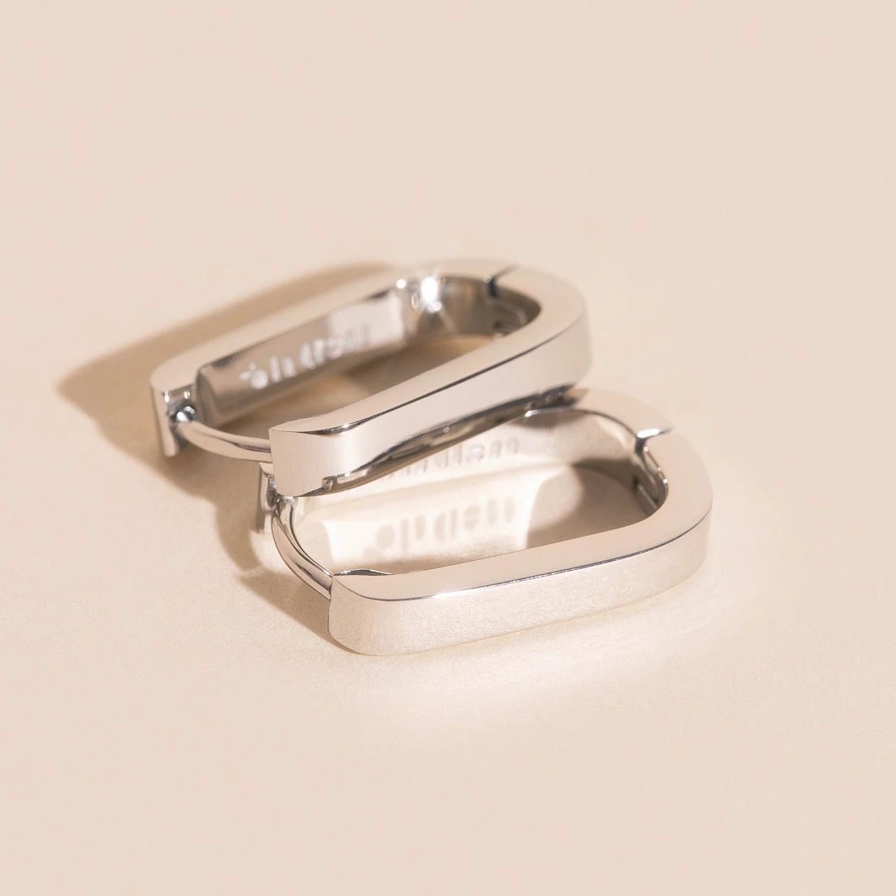 Titanium Smooth Oblong Huggie Hoop Earrings by Oh Clementine