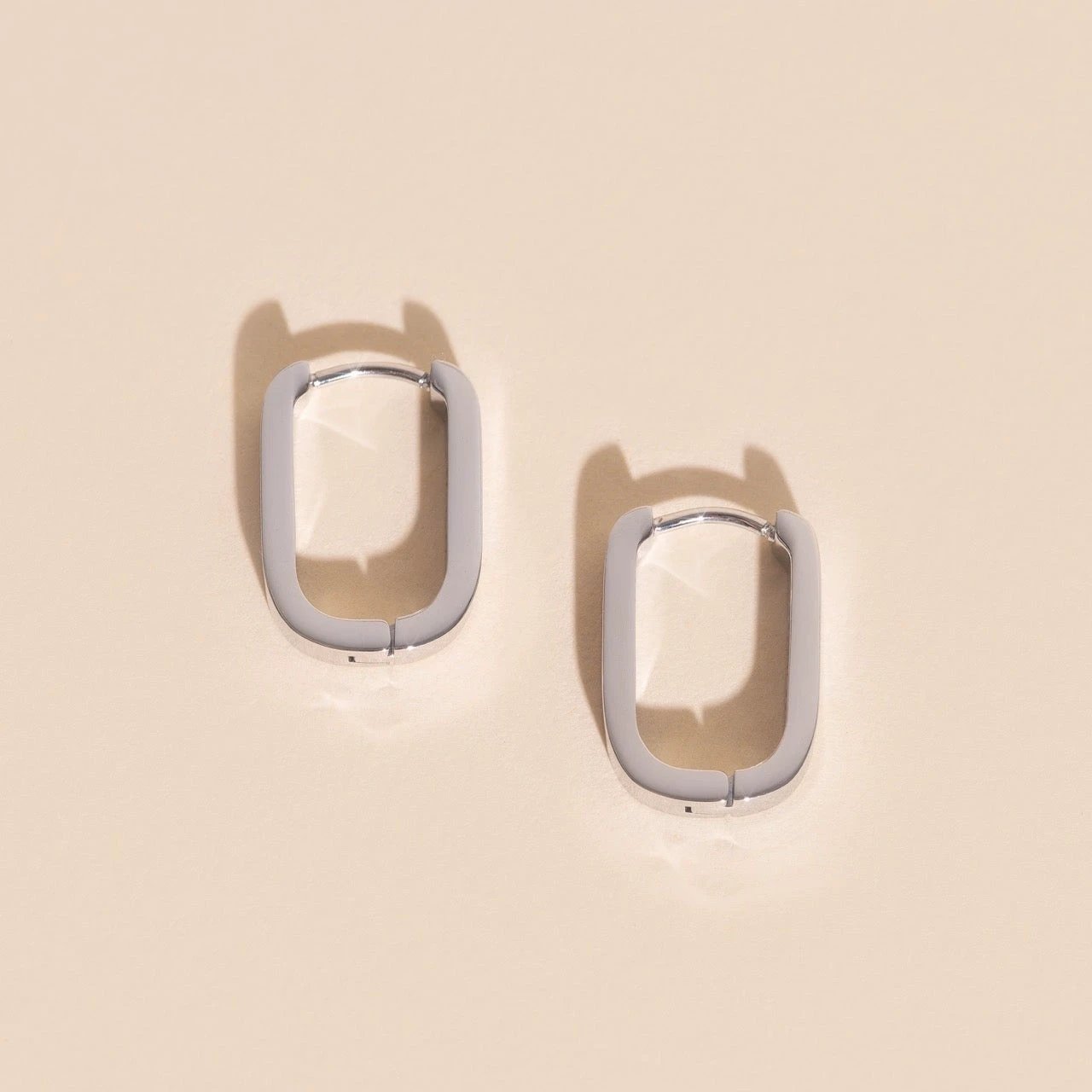 Titanium Smooth Oblong Huggie Hoop Earrings by Oh Clementine