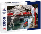 Tourists take a Hanami Boat Tour along Suimon-Gawa Canal under a red bridge and beautiful cherry blossoms (Sakura) in Ogaki 2000pc Puzzle La Vie Bien Tourists take a Hanami Boat Tour along Suimon-Gawa Canal under a red bridge and beautiful cherry blossoms (Sakura) in Ogaki 2000pc Puzzle