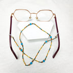 Turquoise and Bronze Beaded Eyeglass Holder by Upavim Crafts