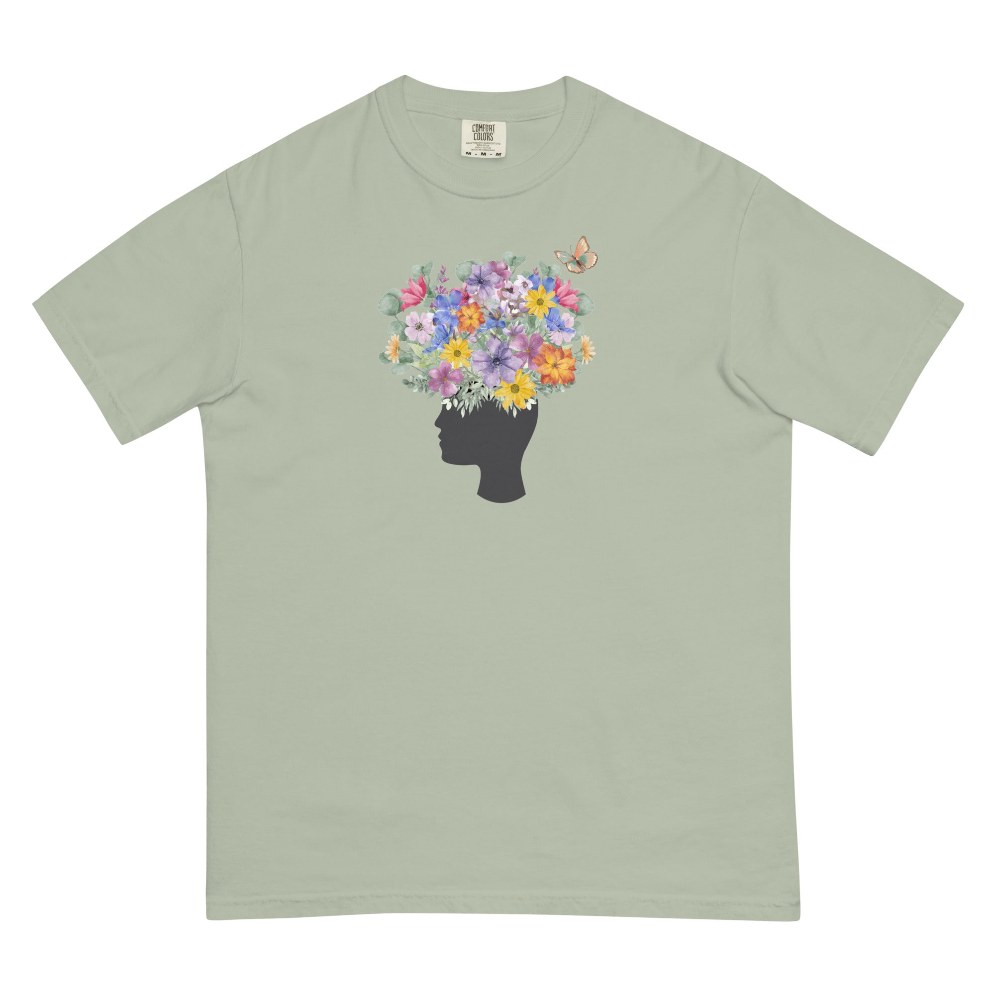An image of the T-shirt with a graphic of a head with flowers coming out of the top