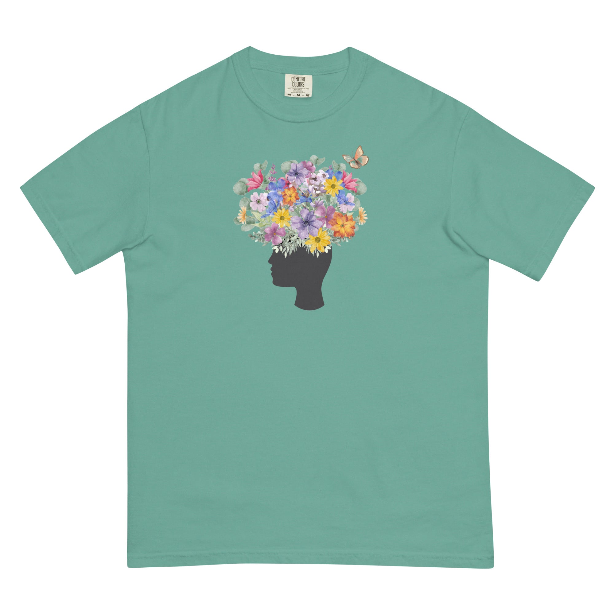 An image of the T-shirt with a graphic of a head with flowers coming out of the top