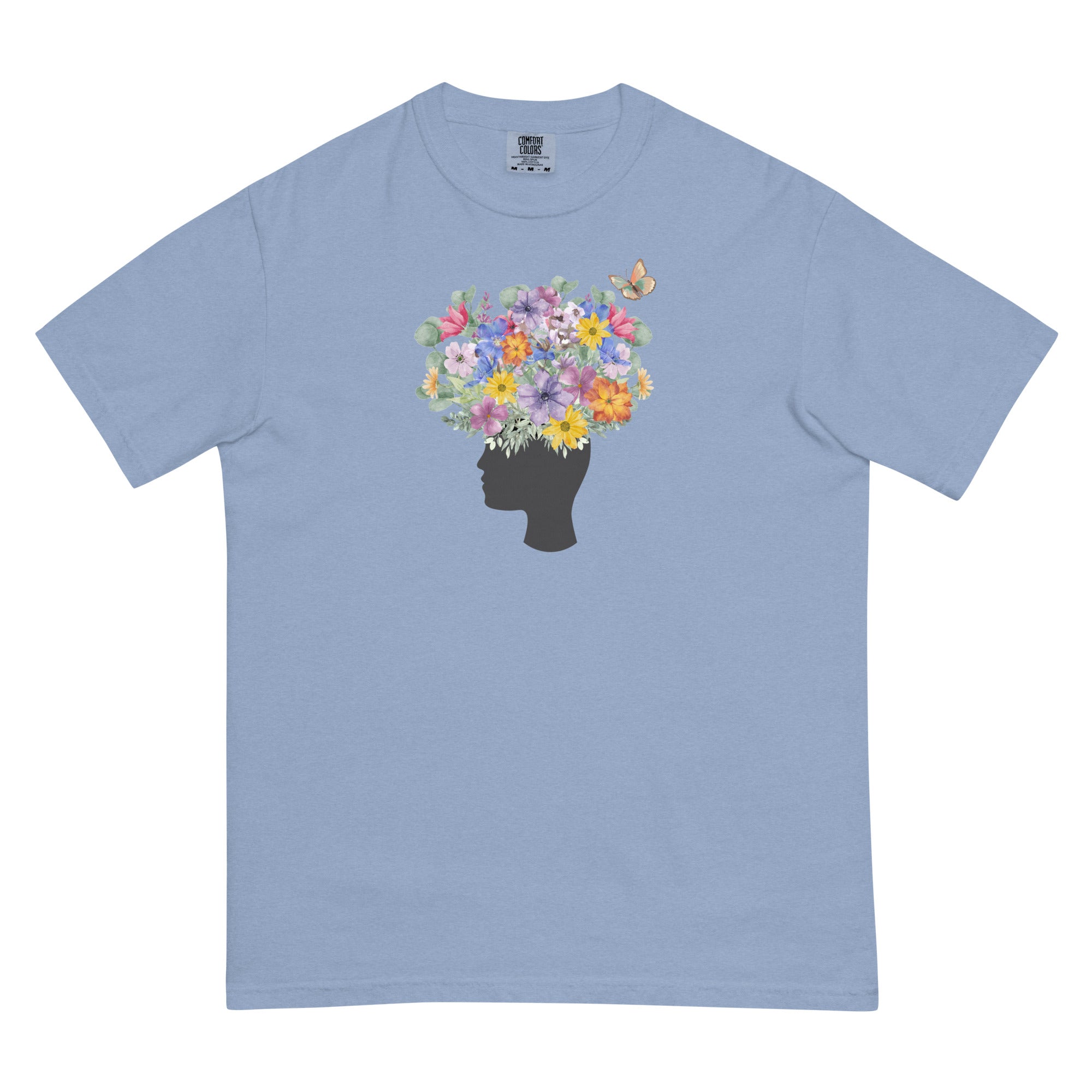 An image of the T-shirt with a graphic of a head with flowers coming out of the top