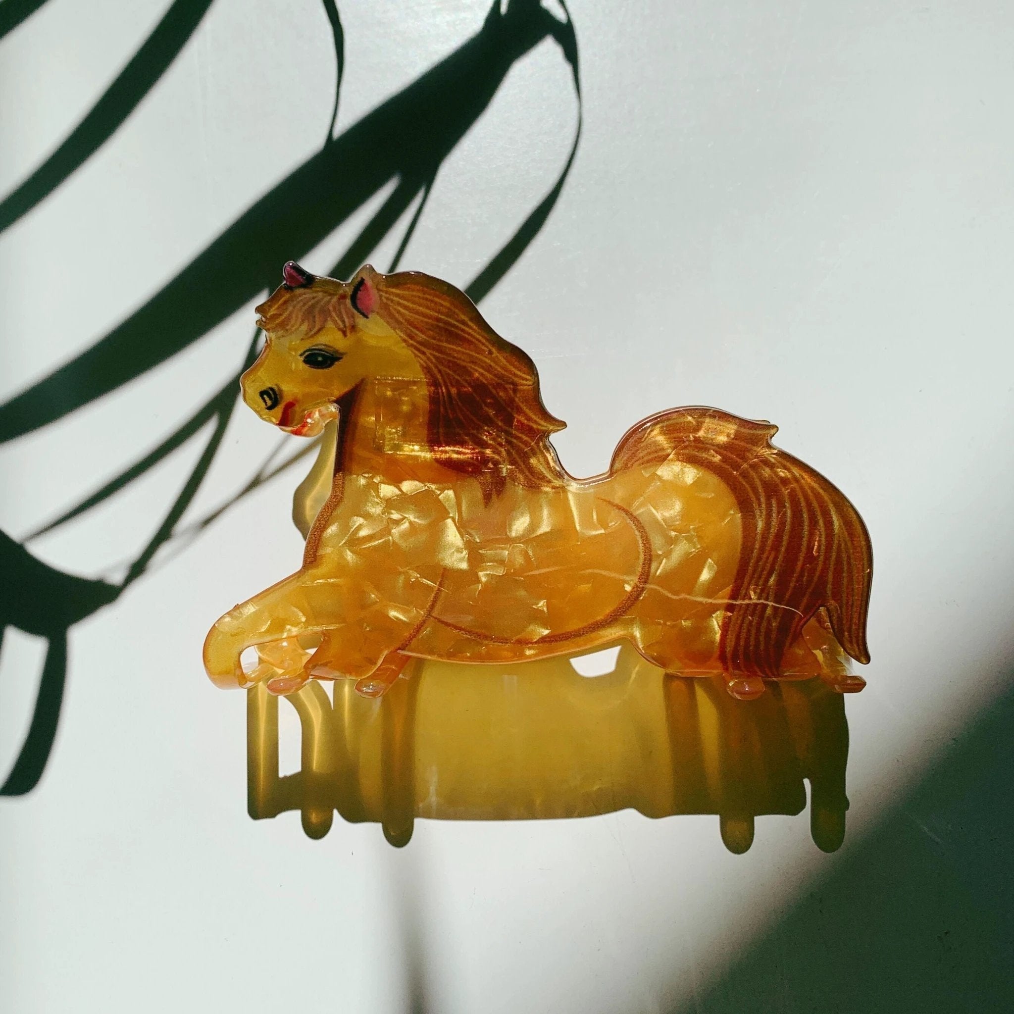 Velvet Claws Golden Horse Hair Claw by The Bullish Store