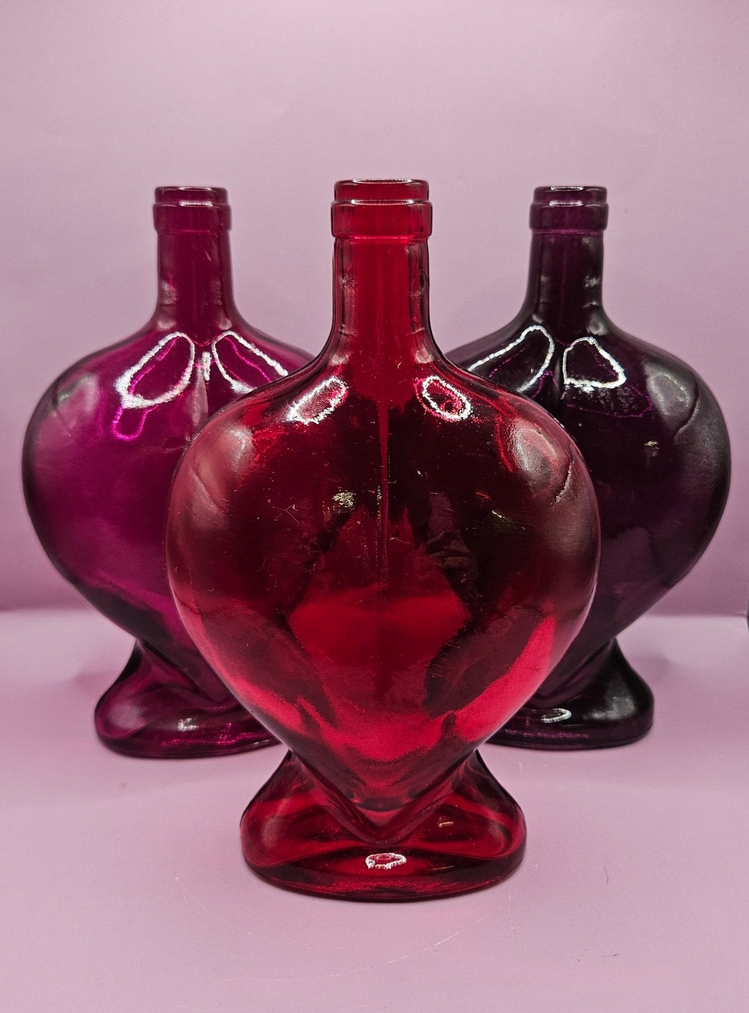 Vintage Heart - Shaped Glass Bottle – Multiple Colors Available – 8.75" x 5.75" Accent Decor La Vie Bien Vintage Heart - Shaped Glass Bottle – Multiple Colors Available – 8.75" x 5.75"