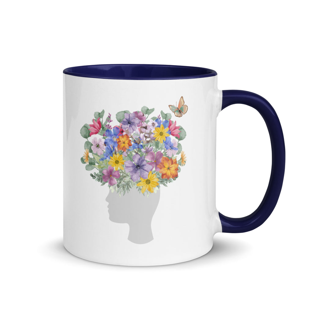 An image of the mug with Color Inside and a graphic of a head with flowers coming out of the top