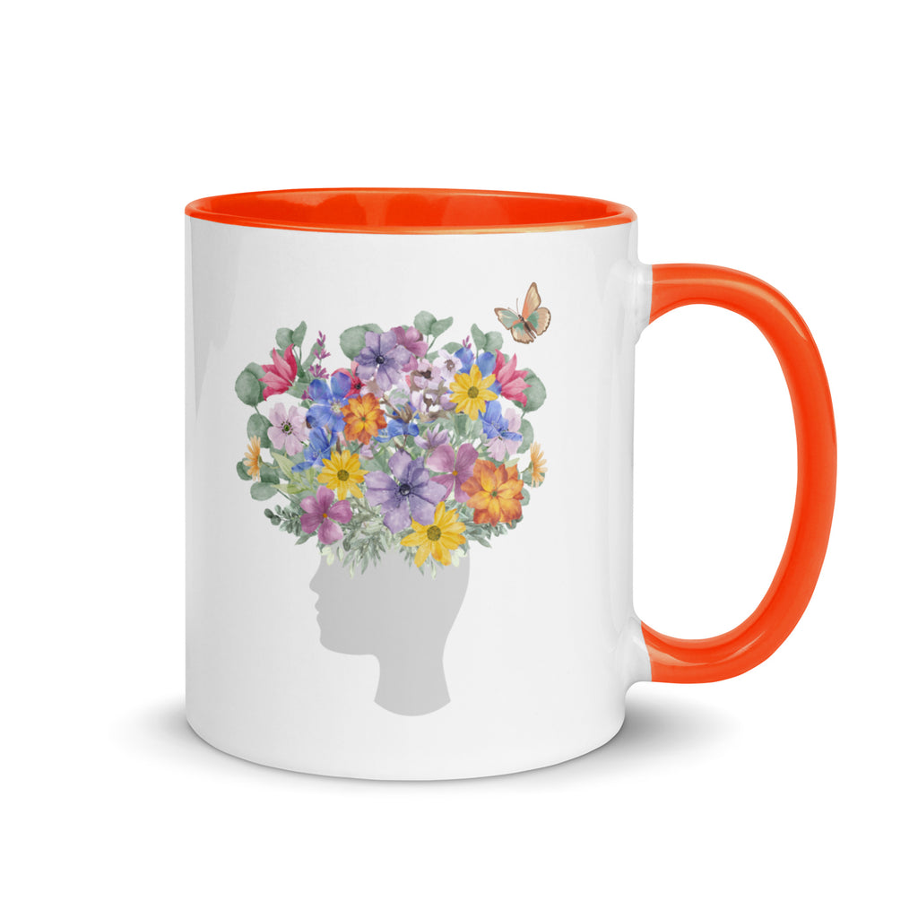 An image of the mug with Color Inside and a graphic of a head with flowers coming out of the top