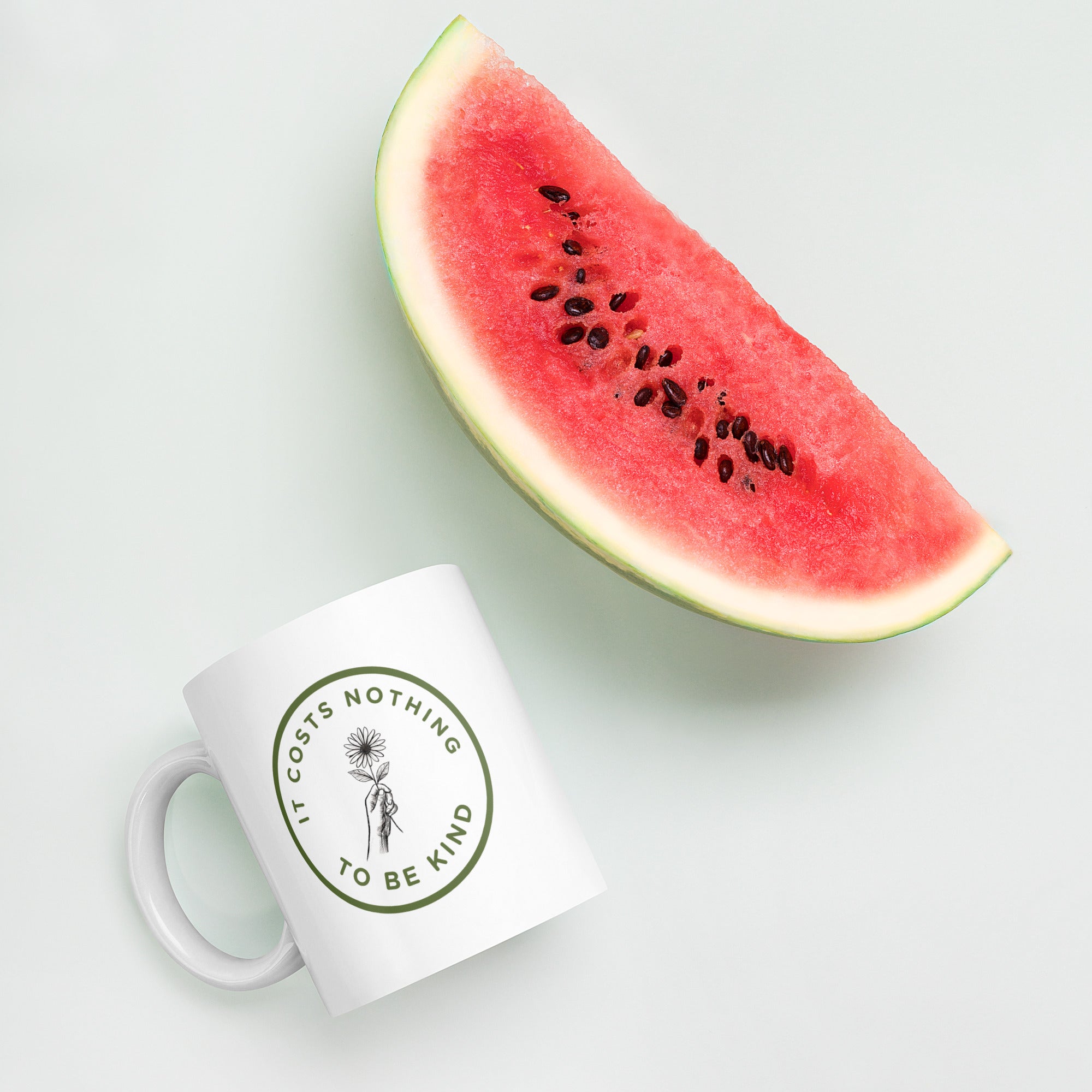 It costs nothing to be kind glossy mug