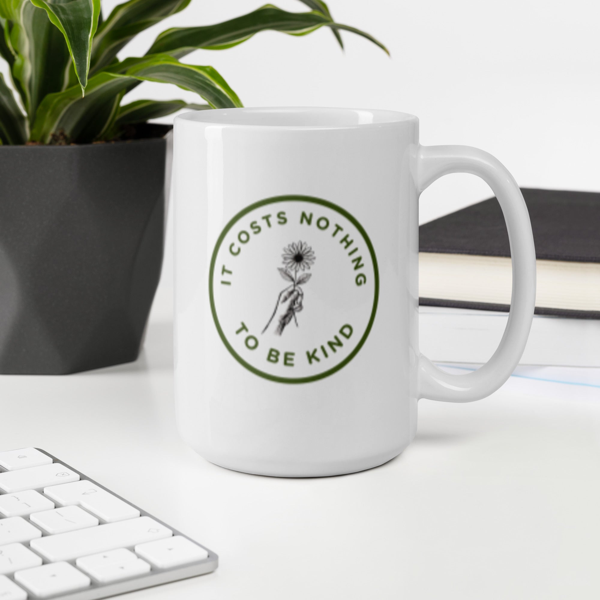 It costs nothing to be kind glossy mug