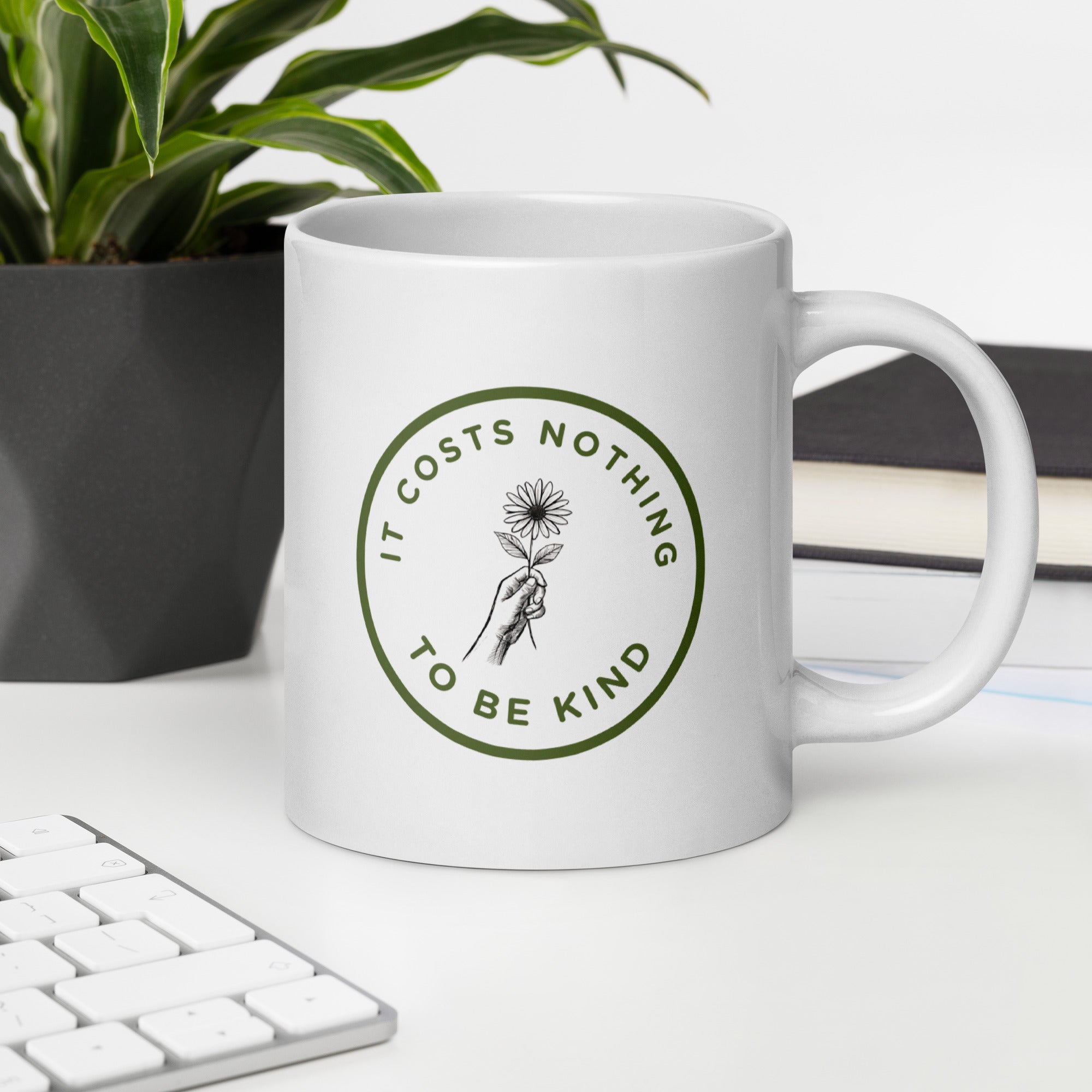 It costs nothing to be kind glossy mug