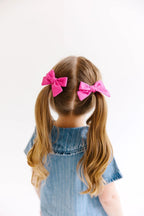 White Mini Solid Pinwheel Pigtail Bow Set by Evie Pearl Handmade