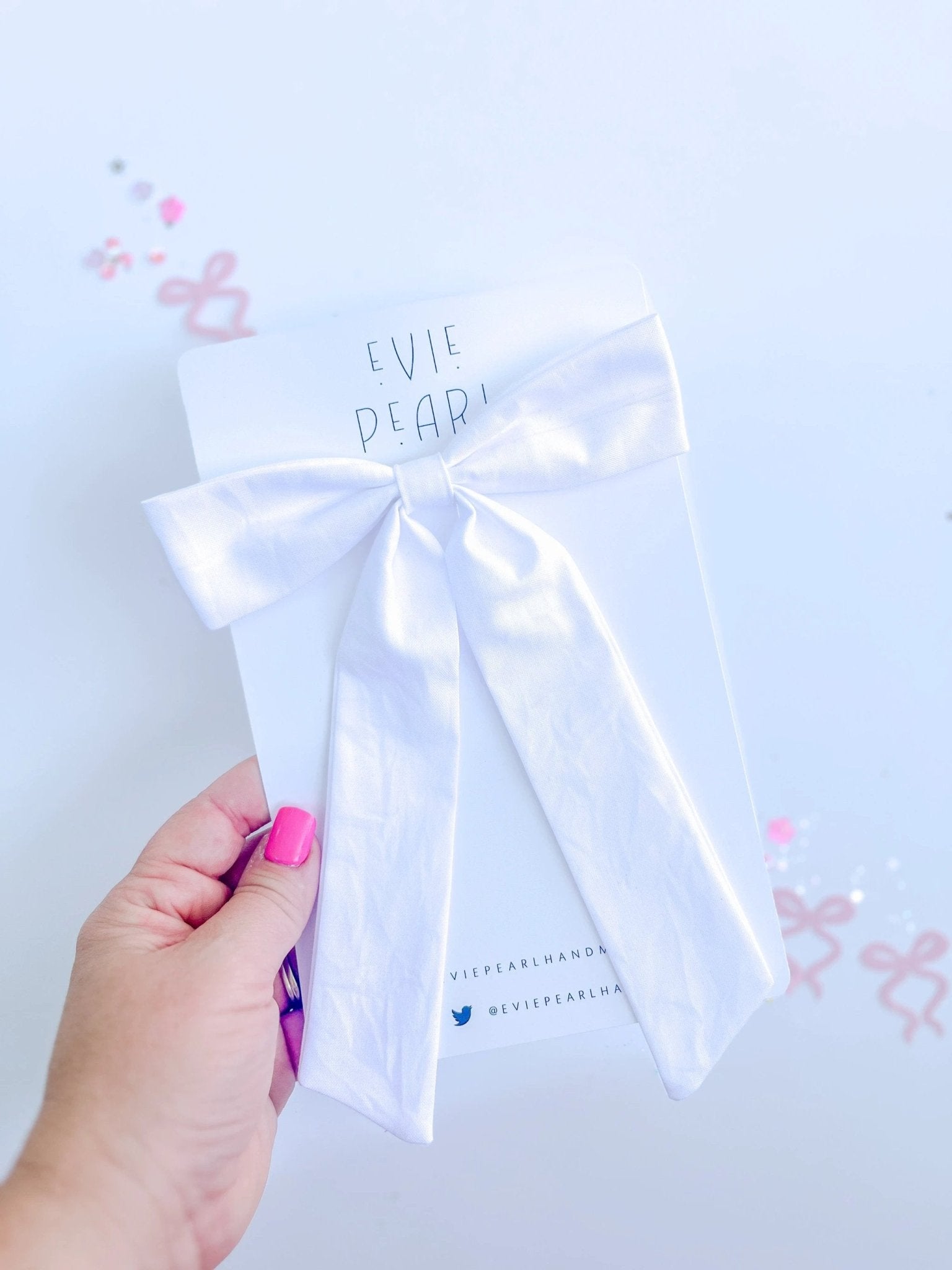 White Solid Longtailed Bow by Evie Pearl Handmade
