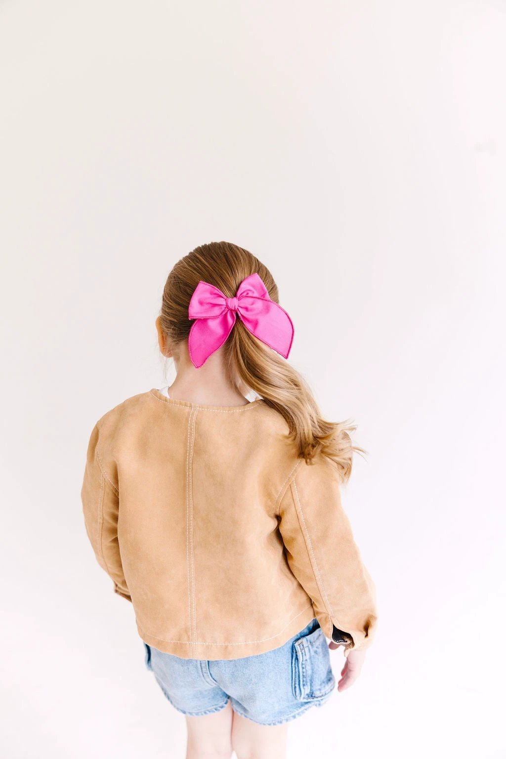 White Solid Medium Bow by Evie Pearl Handmade